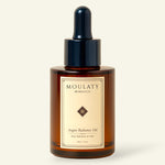 Amber glass bottle of Moulaty Argan Radiance Oil with dropper for deep hydration and glow
