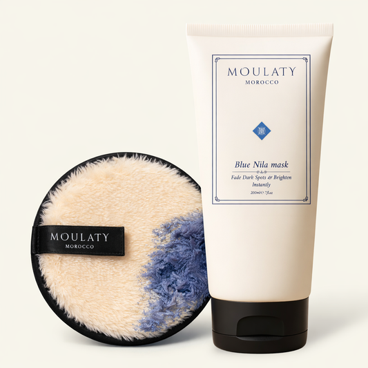 Blue Nila mask tube with exfoliating pad, Moroccan skincare for brightening and dark spot fading.