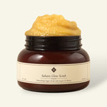 Sahara Glow Scrub jar with sugar scrub, featuring argan oil and honey for nourishing skincare.