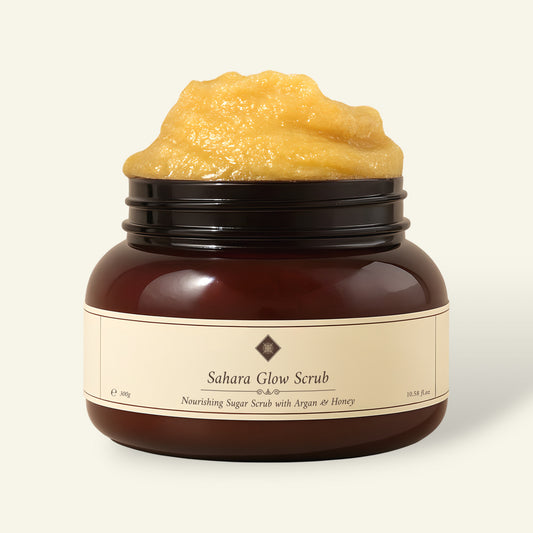 Sahara Glow Scrub jar with sugar scrub, featuring argan oil and honey for nourishing skincare.