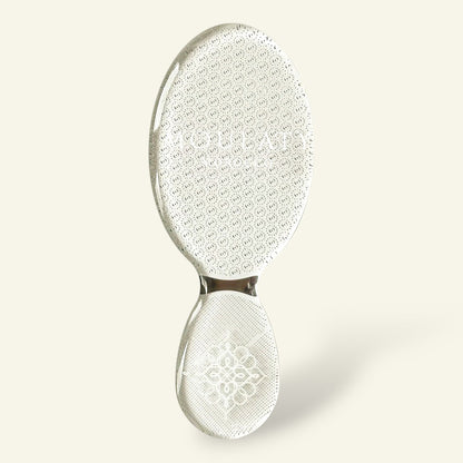 Moroccan nano glass foot file exfoliator with textured surface on light background
