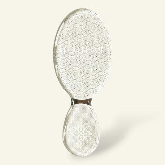 Moroccan nano glass foot file exfoliator with textured surface on light background